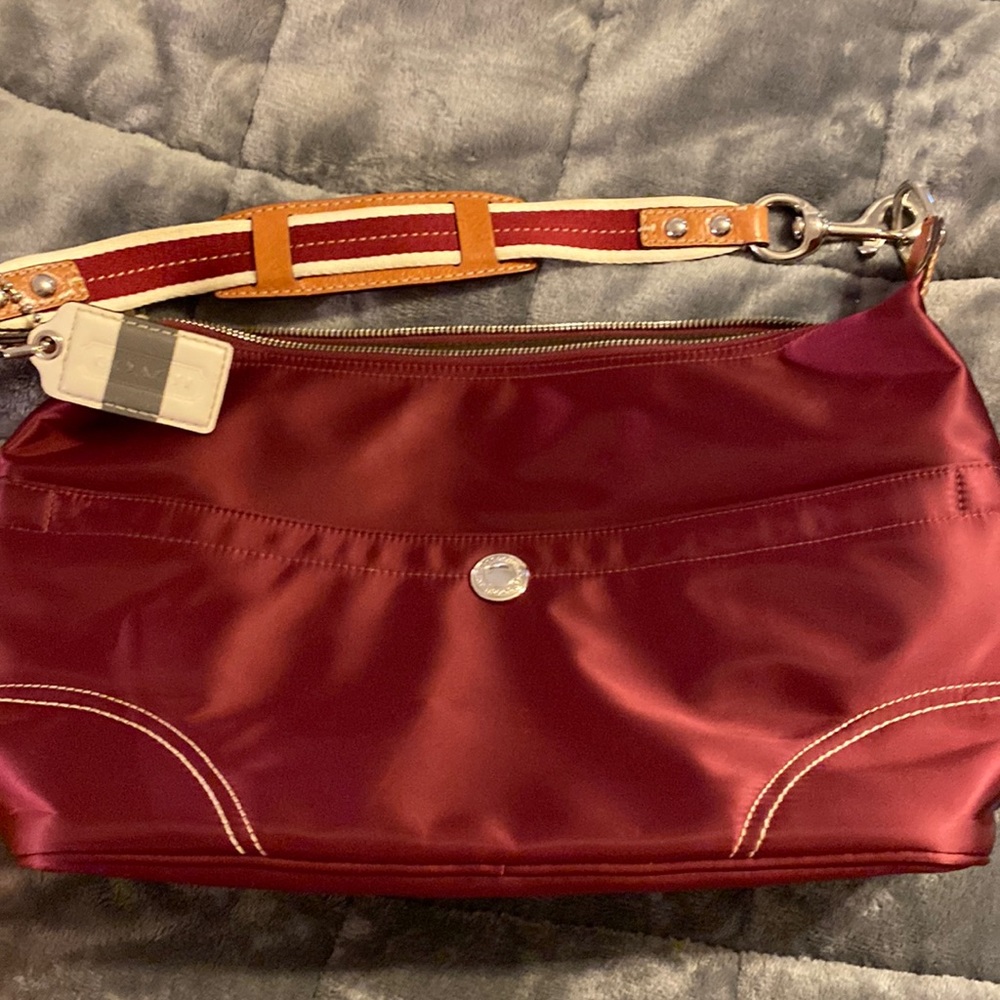 Satin burgundy hobo style Coach handbag